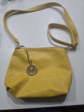MIAK Collection by Mia K. Medina vegan leather crossbody bag features gold-tone